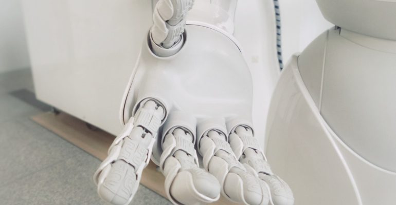 closeup photo of white robot arm